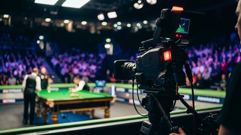Television studio camera focused on a snooker table during a live broadcast event